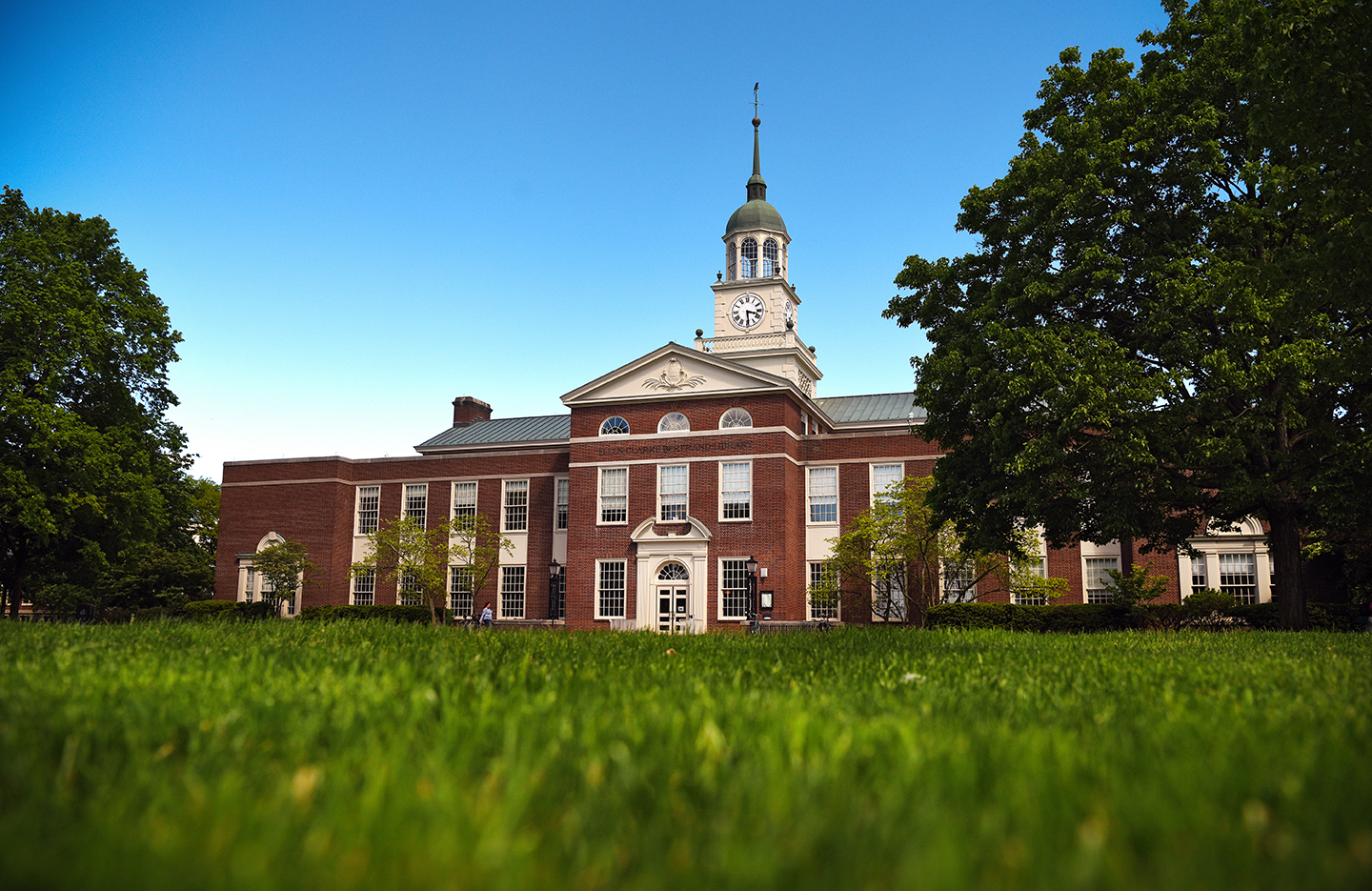 Bertrand Library, a medium sized, 3-story brick building with a clock tower at the top.